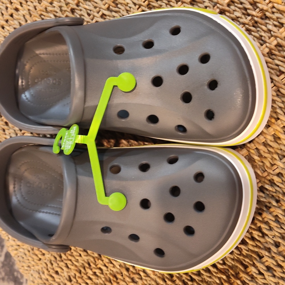 Never worn Crocs. Size women 8. Gray & Lime